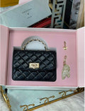 Cressida Quilted Top Handle Bag With Bag Charms – Black