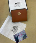 Coach Snap Wallet In Signature Canvas